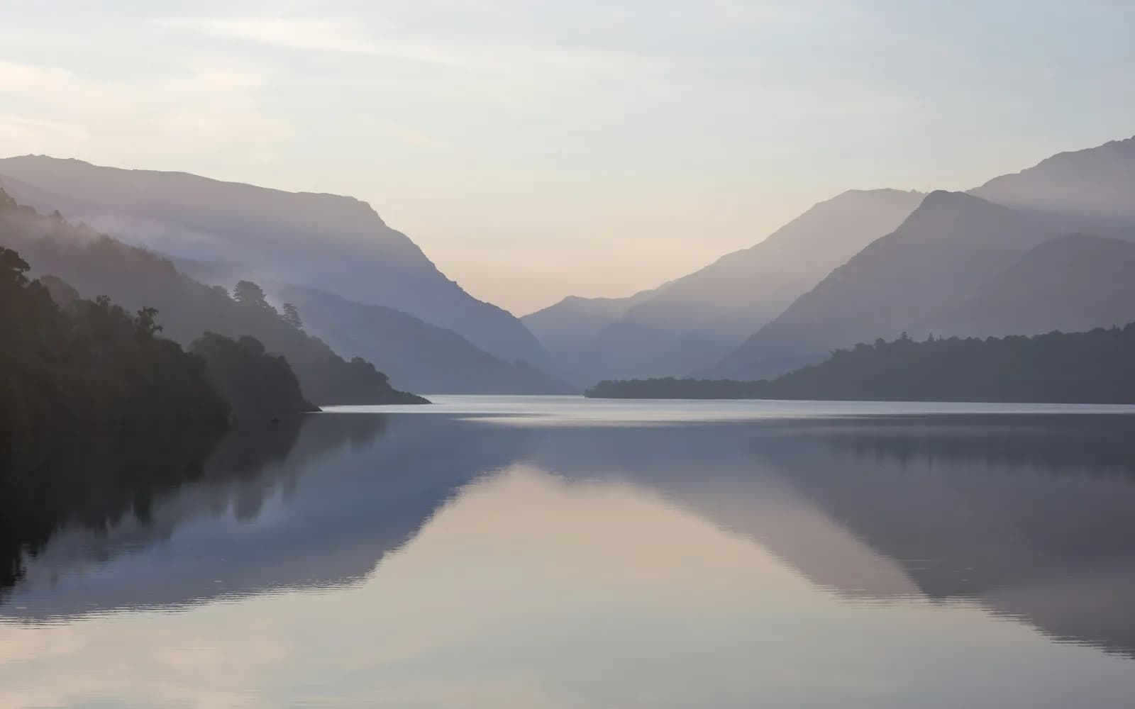 mountain near body of water during daytime