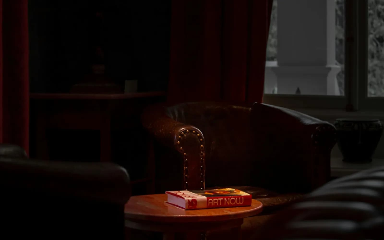 red and yellow book on brown wooden table